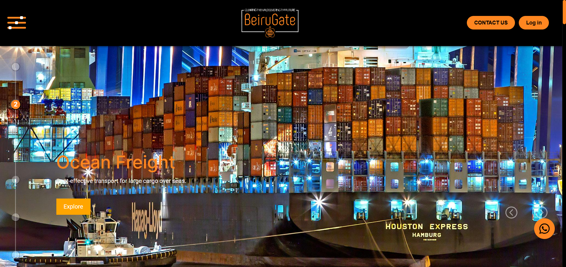 Snowy mountains above a turquoise lake under white clouds